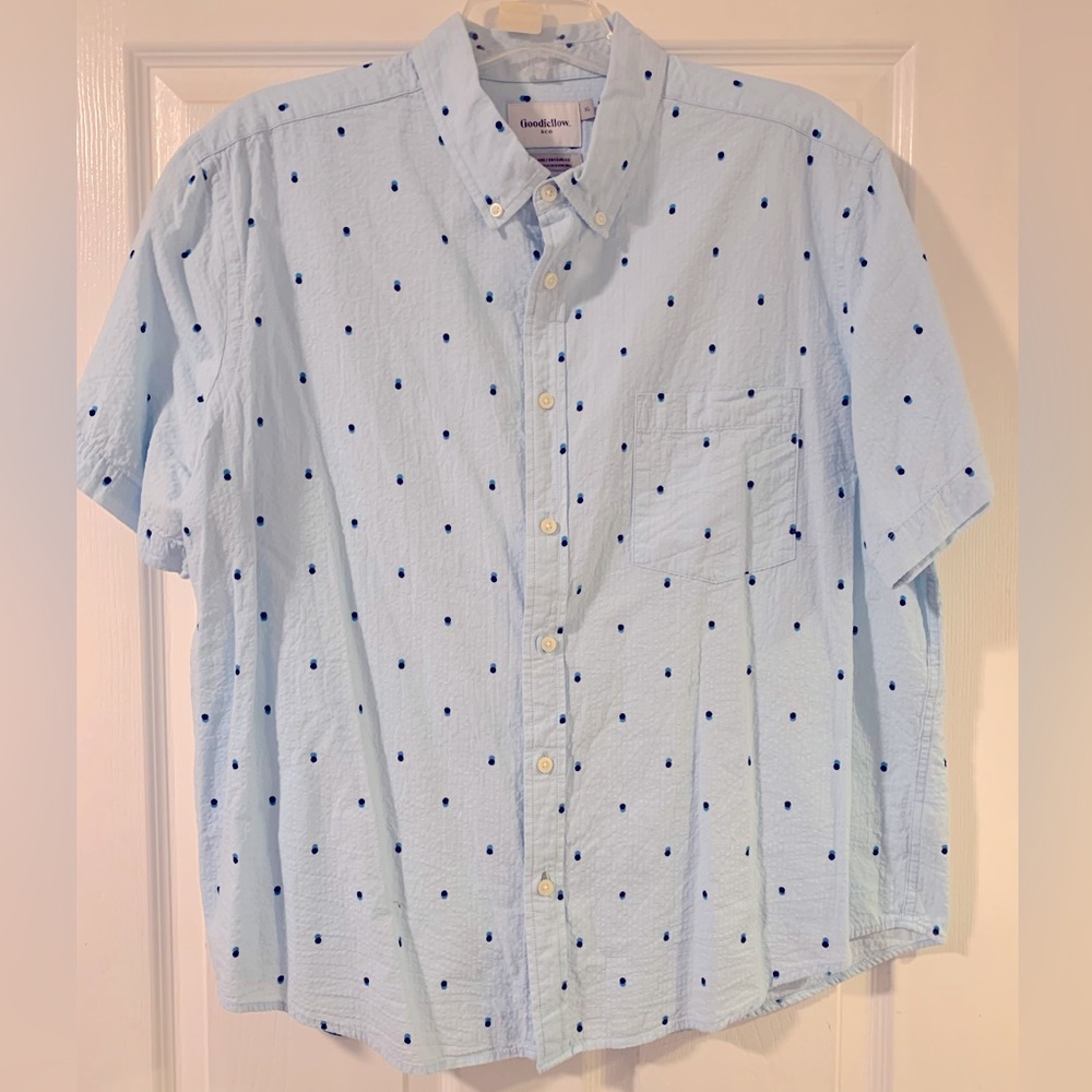Light blue button down. Summer weight. Worn twice. Excellent condition